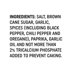 Holy Garlic All-Purpose Seasoning being sprinkled on chicken for savory aroma and crisp edges.