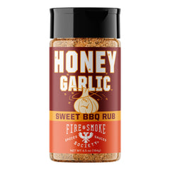 Fire & Smoke Society Honey Garlic BBQ Rub jar front for bold pork and poultry flavor.