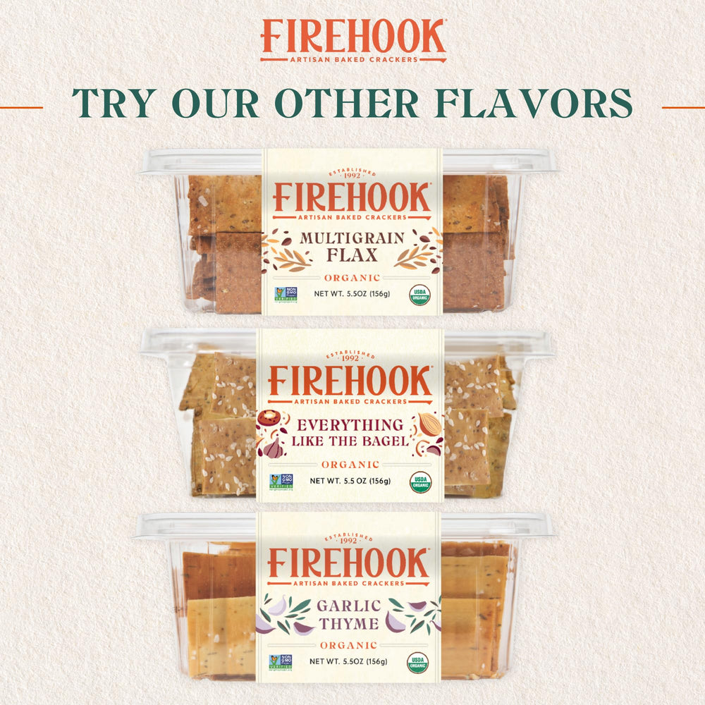 Firehook crackers displayed on a stylish serving plate for guests.