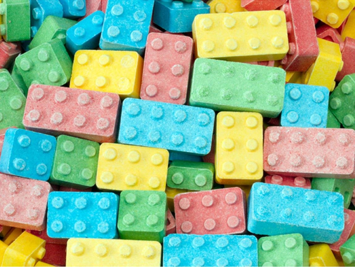 FIRST CLASS VENDING Building Blox Candy Blocks closeup showing flavors, ideal for creative candy building