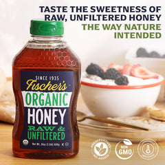 Fischer's honey squeeze bottle being poured for easy drizzle on fruit and oats.