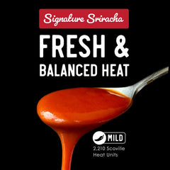 Pour shot of Fix Hot Sauce Sriracha for smooth, balanced heat.