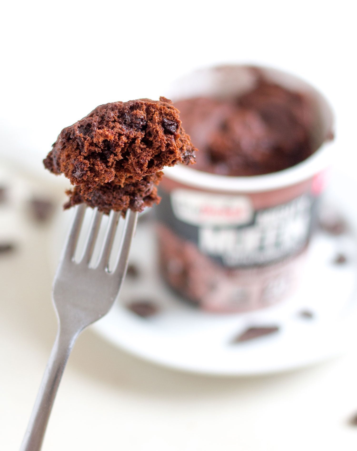 Mighty Muffins double chocolate chips close-up, indulgent post-workout treat.