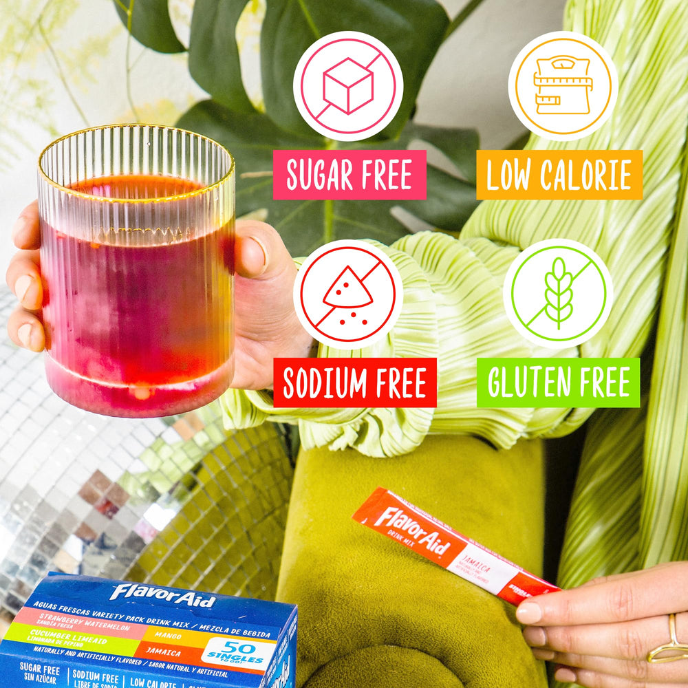Flavor Aid Mango Aguas Frescas being poured for tropical refreshment.