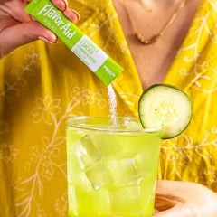 Flavor Aid Singles To Go cucumber-lime in a water bottle for quick flavor boost.