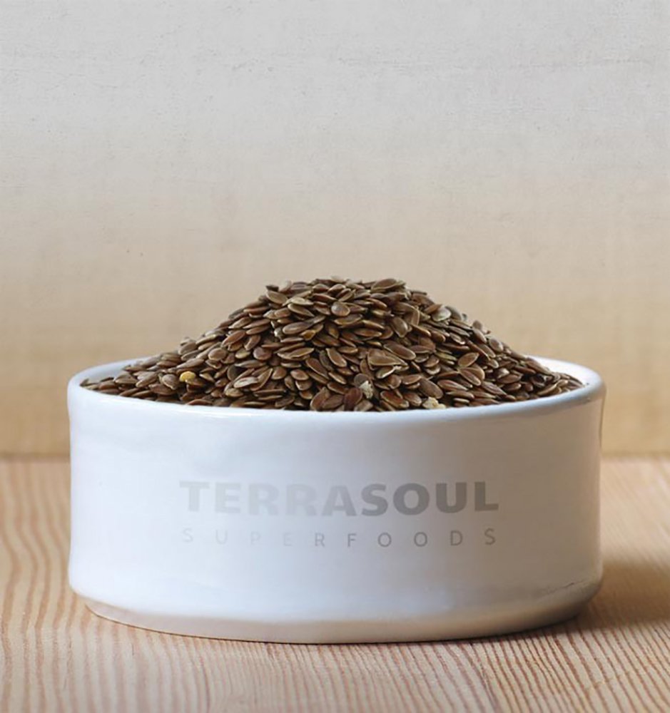 Flax seeds spread on the counter, ready for baking and toppings.