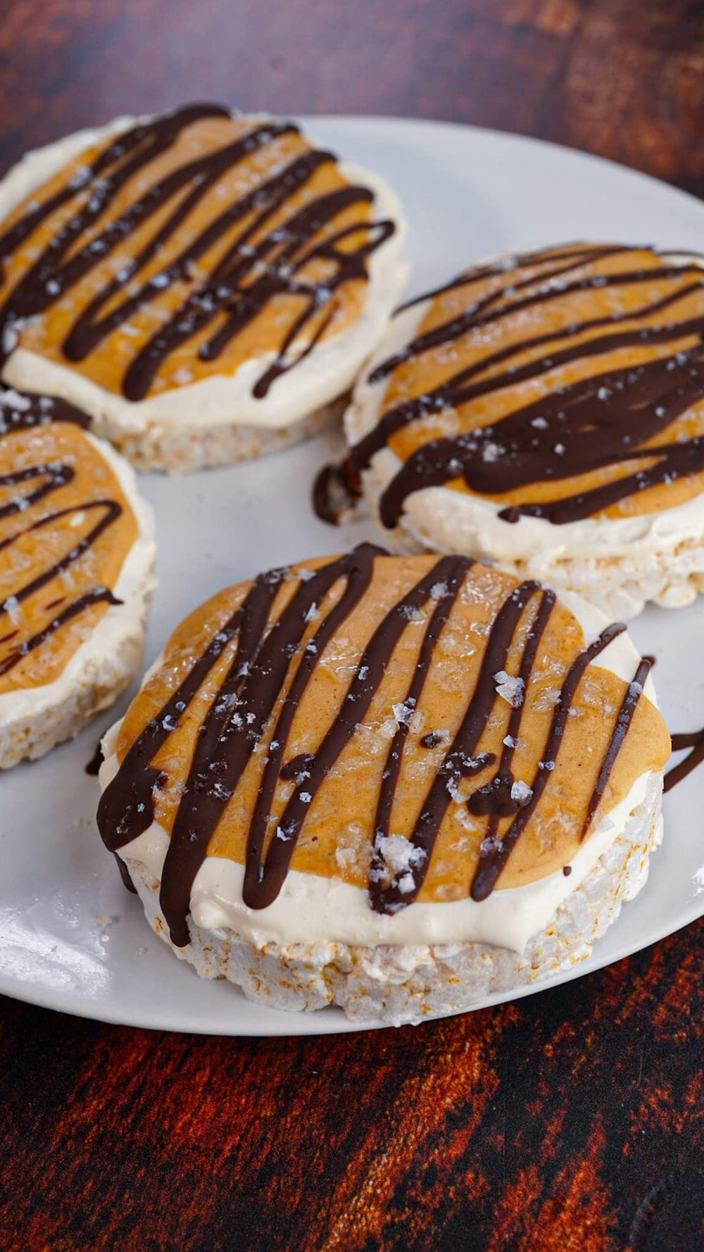 Spreading Flex Vegan Protein Cookie Butter Powder on toast for peanut butter flavor