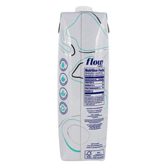 Flow alkaline spring water 1L label detail highlights premium quality and branding.