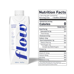 Flow alkaline spring water pours smoothly, showcasing natural electrolytes for quick rehydration.