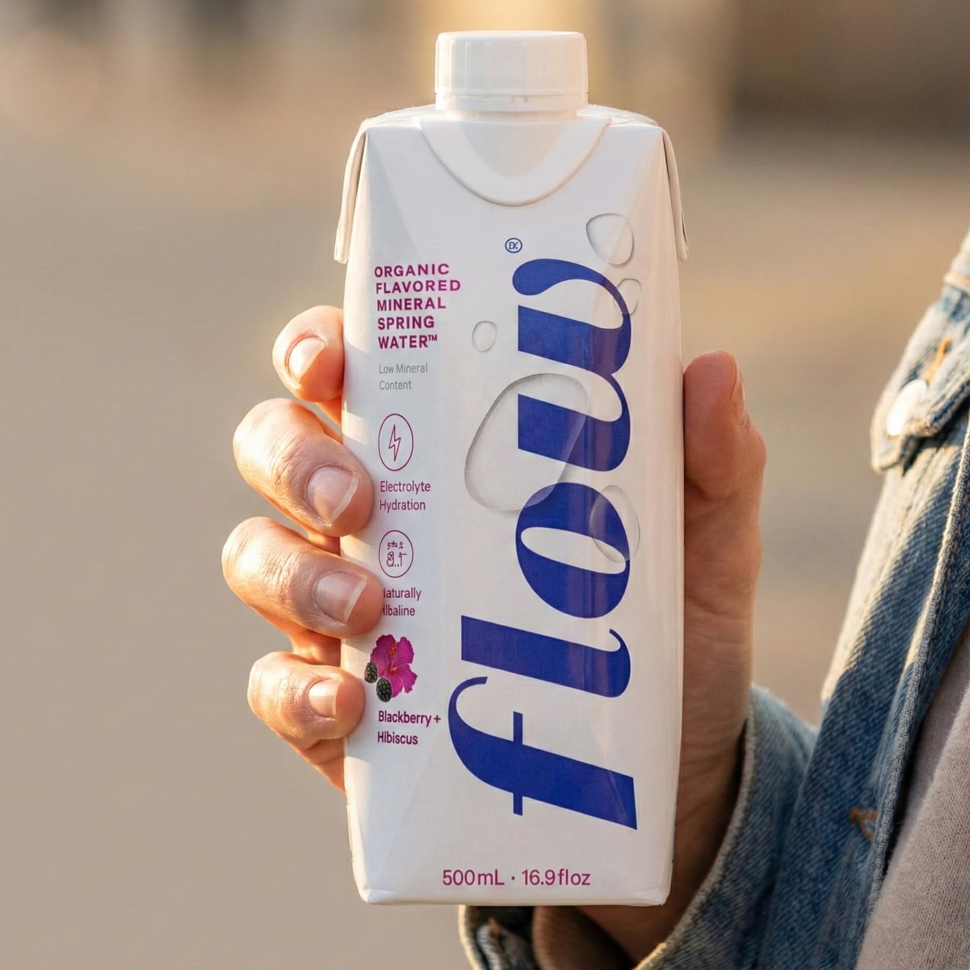 Flow 12-pack carton image indicates convenient, recyclable packaging for busy days.