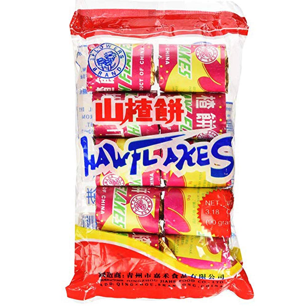 FLOWERS Haw Flakes four-pack display of traditional hawthorn candy.