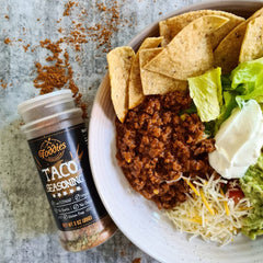 Foddies Taco Seasoning label on packaging emphasizing gluten-free, vegan ingredients.