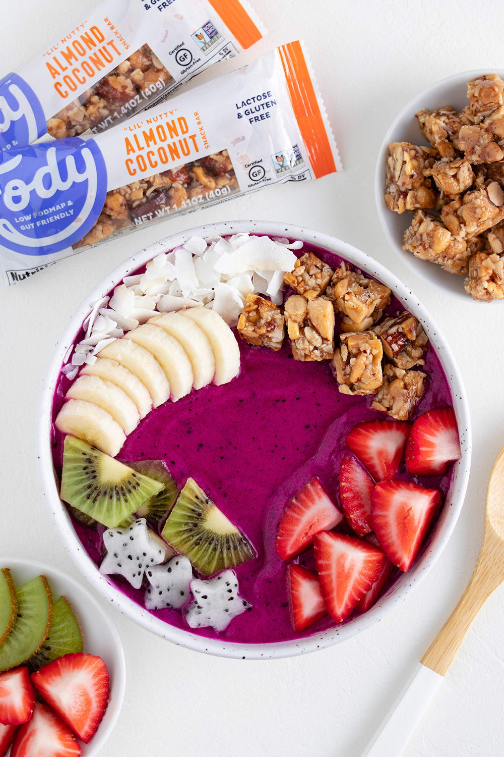Fody Almond Coconut Snack Bars on grocery shelf for health-conscious shoppers.