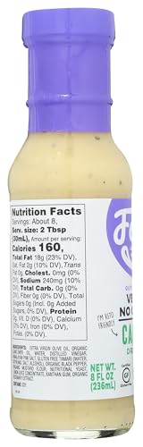 Closeup of Fody Caesar dressing ingredients showing creamy texture.