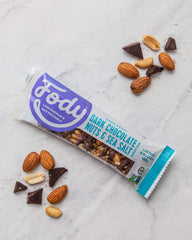 Cross-section of a Fody bar showing chocolate coating and nut blend.