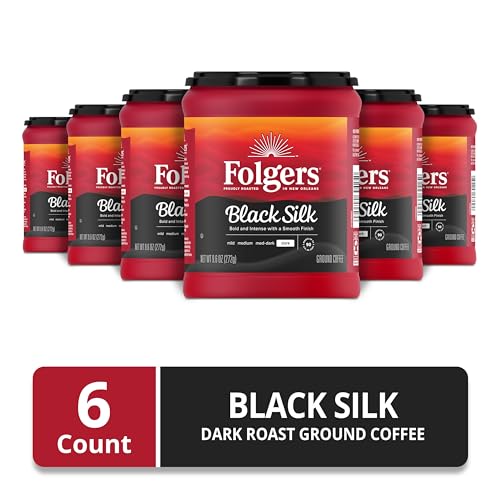 Close-up of AromaSeal lid on Folgers Black Silk canister emphasizes freshness for flavorful brews.
