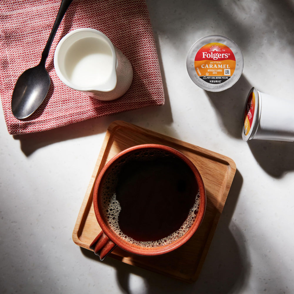 Folgers Buttery Caramel being poured into a mug for savor-ready flavor