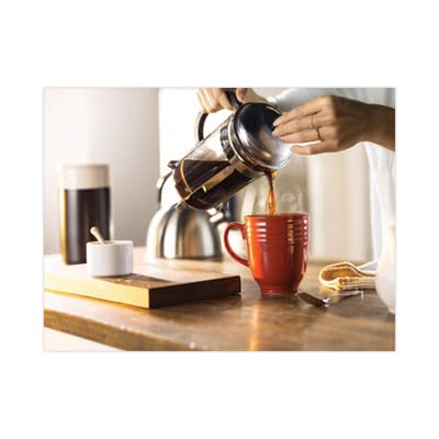 Folgers Classic Decaf mug scene, smooth flavor ideal for evenings.