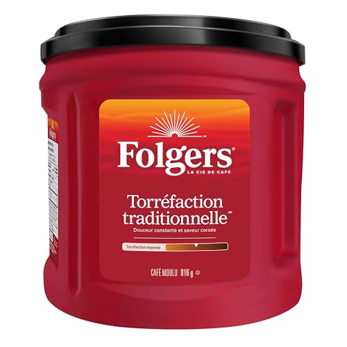 Folgers Classic Roast coffee beans closeup showing rich aroma and natural texture.