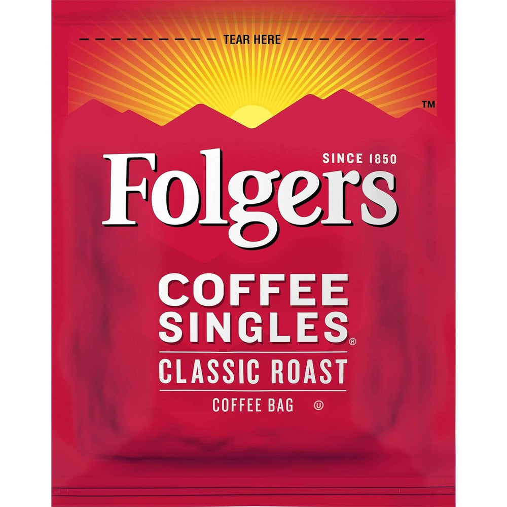 Folgers Coffee Singles cup steaming to emphasize aroma and warmth.