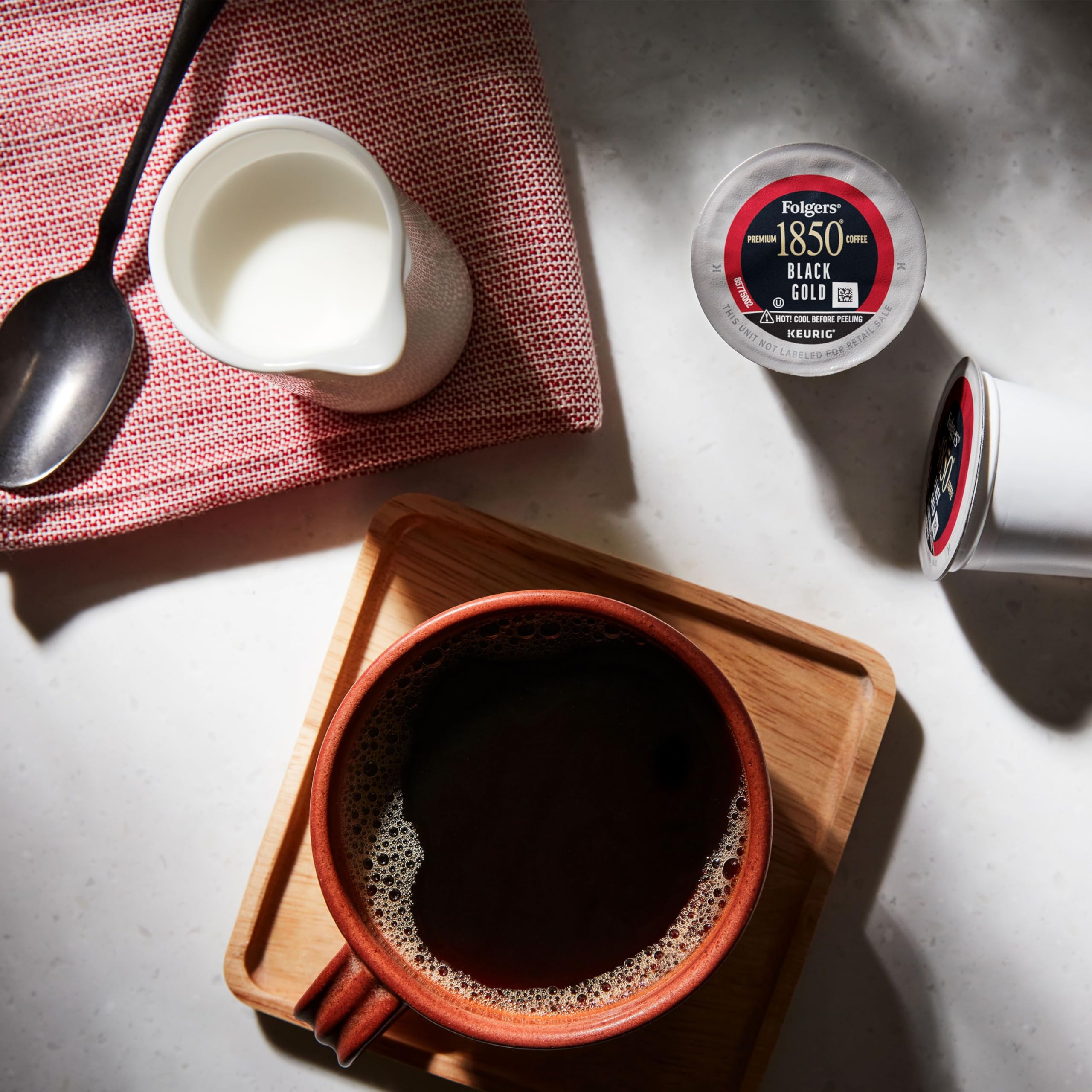 Folgers fire-roasted beans emphasizing traditional roasting craft