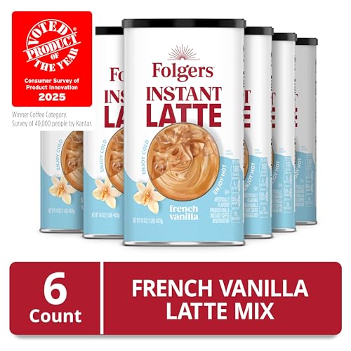 Folgers French Vanilla latte mix dissolving in hot milk to create a creamy hot latte