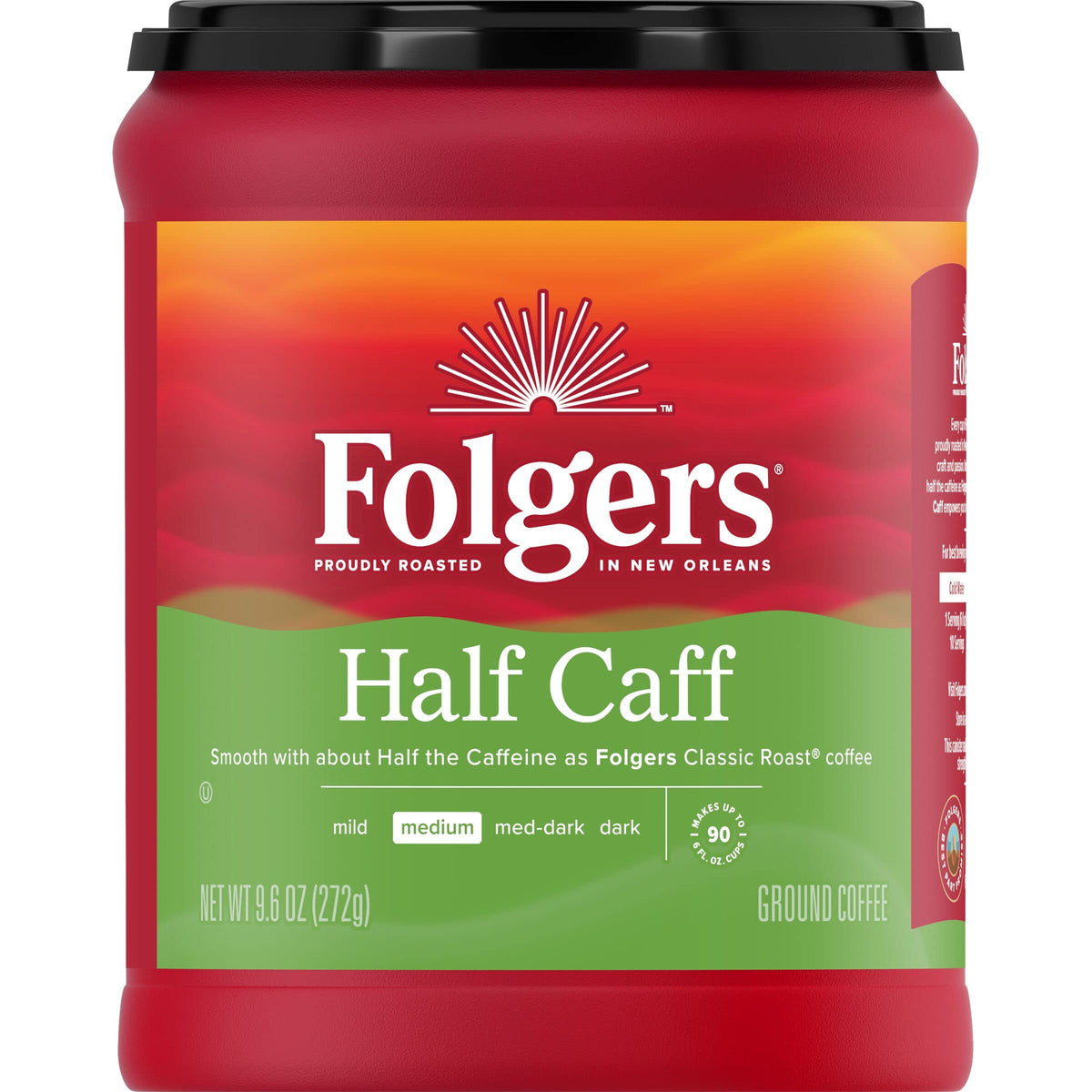 Folgers Half Caff ground coffee canister on a kitchen counter, ideal for a smoother morning routine.