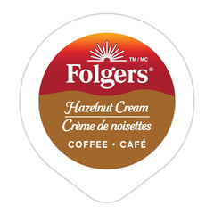 Folgers Hazelnut Cream K-Cup pod in brew cup showcases smooth, balanced coffee.