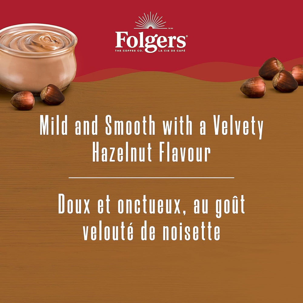 Folgers Hazelnut Cream K-Cup pod steaming mug highlights inviting aroma.