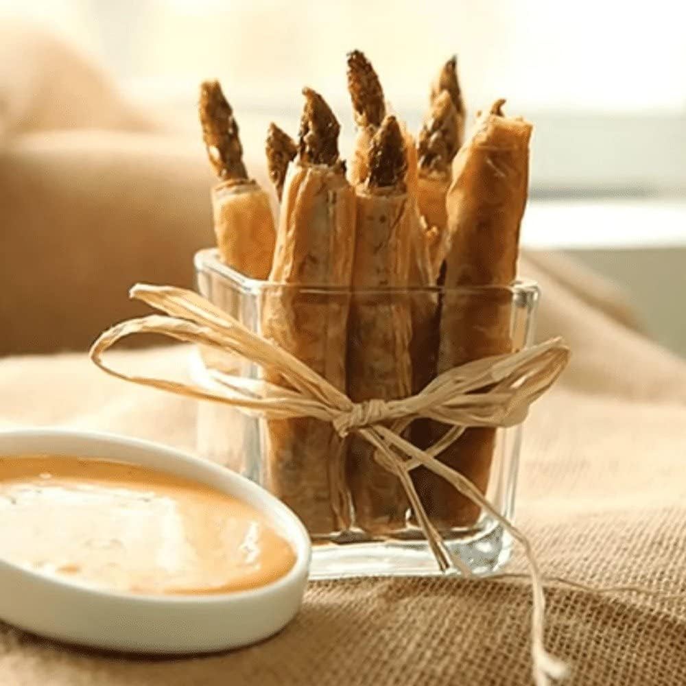 Jar with knife showing easy serving of Foster's Pickled Asparagus Spears