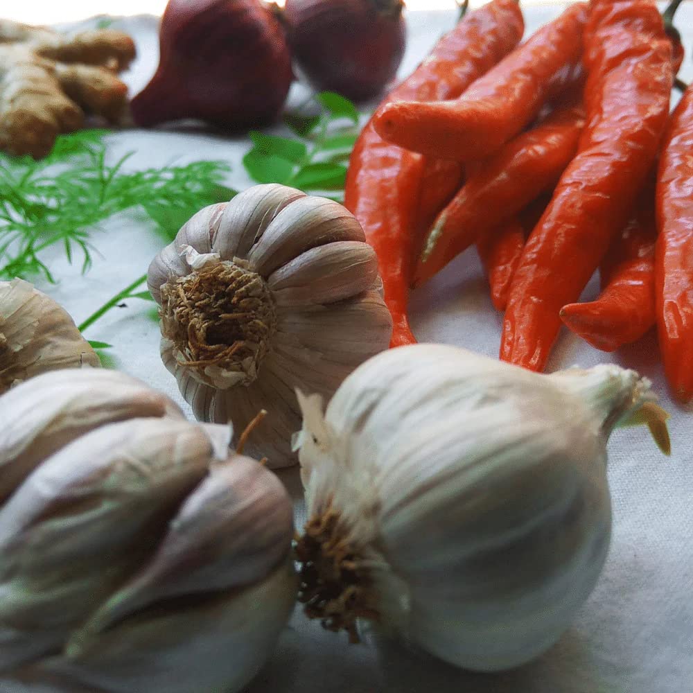 Foster's pickled garlic cloves glass jar on shelf as pantry staple