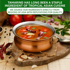 Pad Thai sauce using Four Elephants Tamarind Concentrate in a wok.