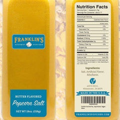Close-up of Franklin's Butter Flavored Salt shaker shows fine texture for even seasoning.