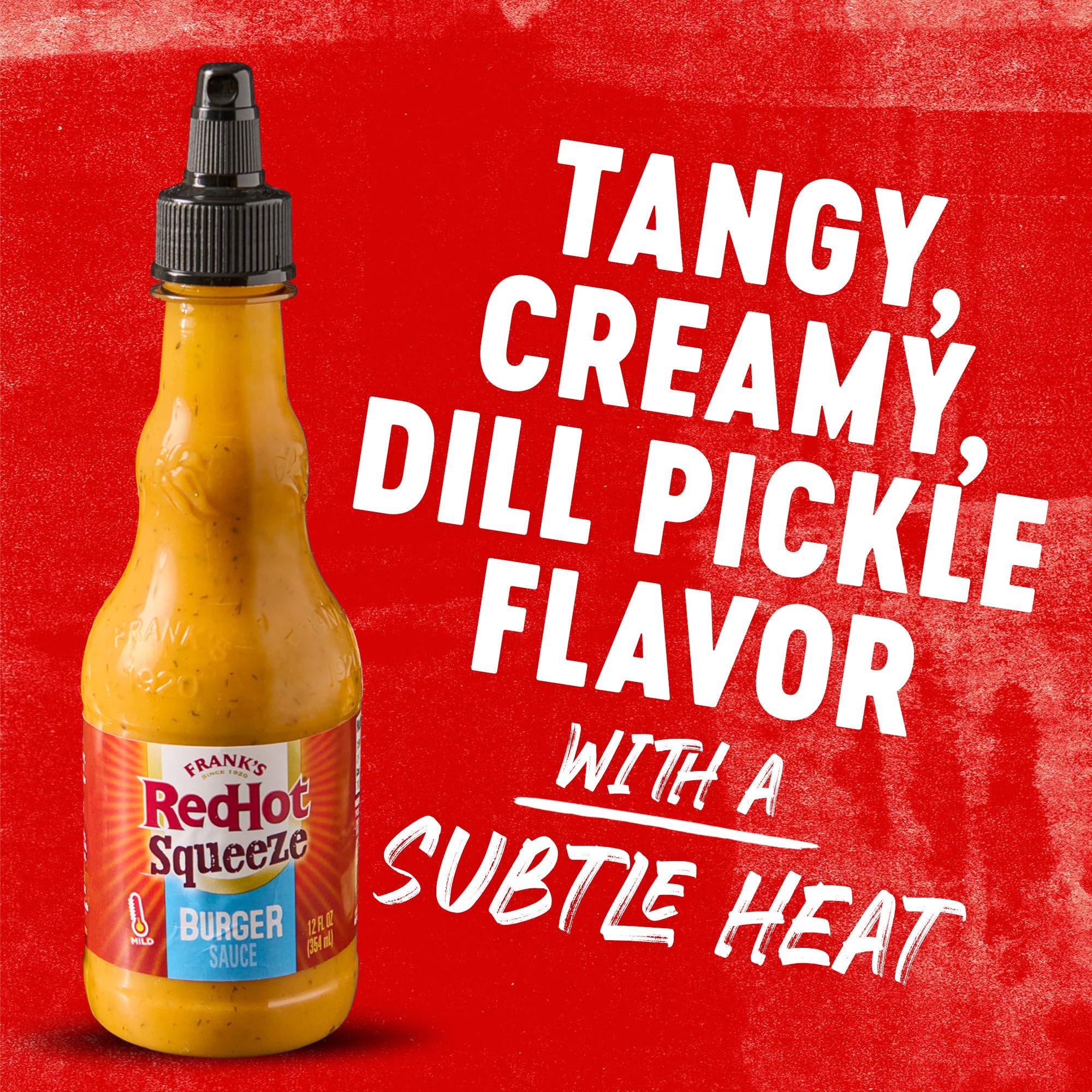 Fries dipped in Frank's RedHot Burger Sauce for zesty flavor