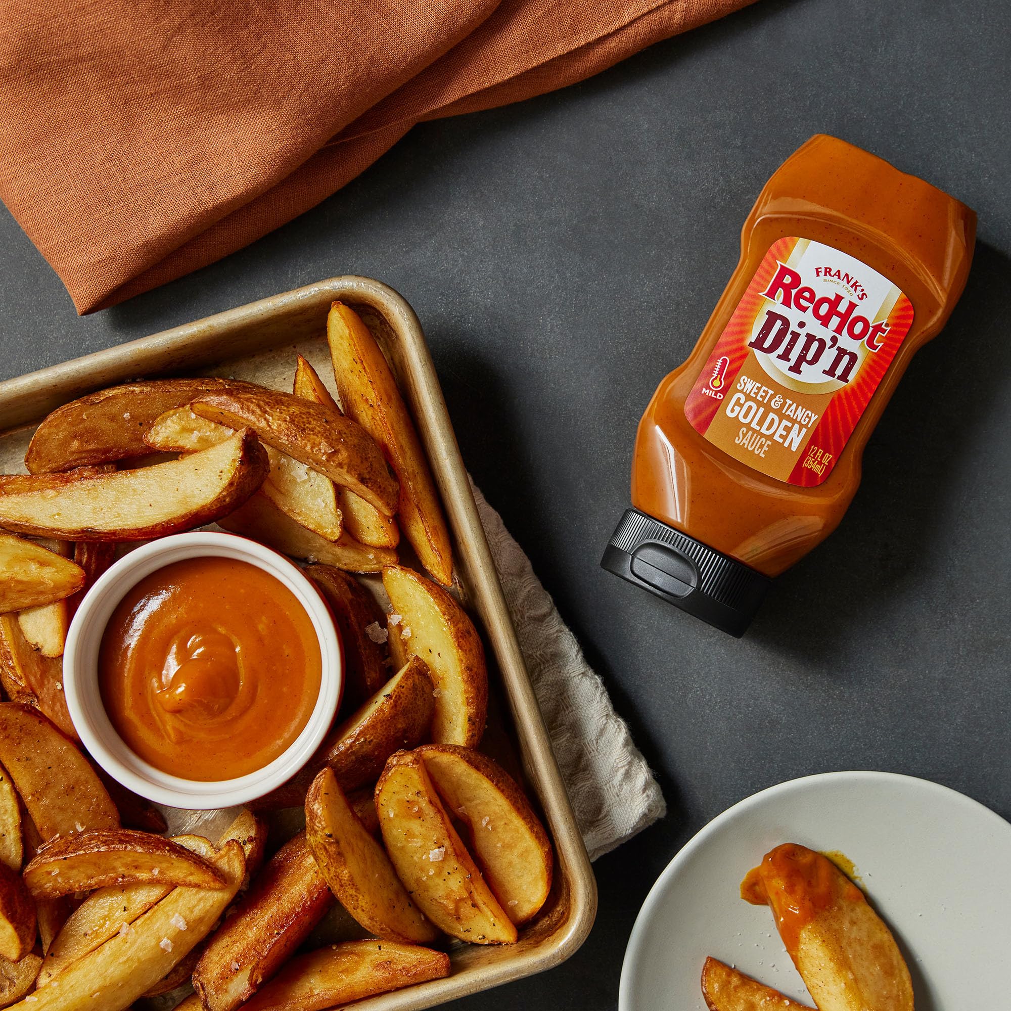 Onion rings with Frank's RedHot Dip'N Golden Sauce for a tangy kick