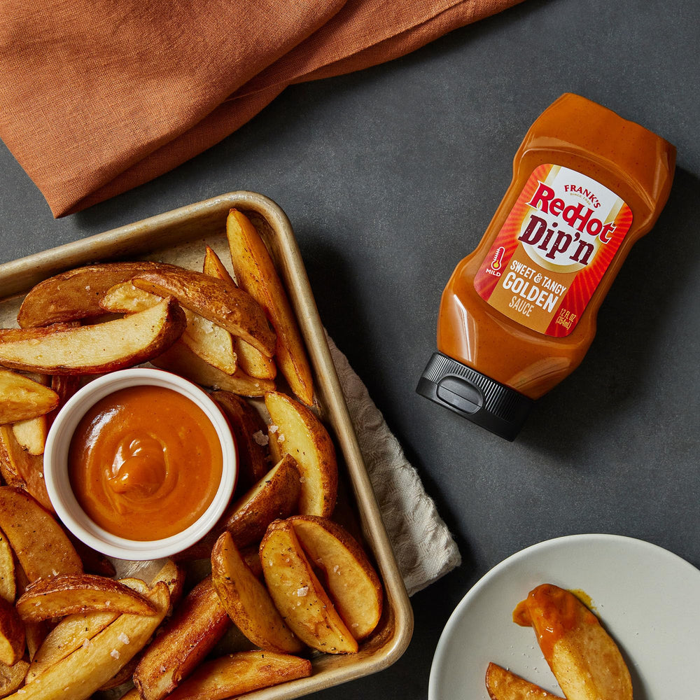 Onion rings with Frank's RedHot Dip'N Golden Sauce for a tangy kick