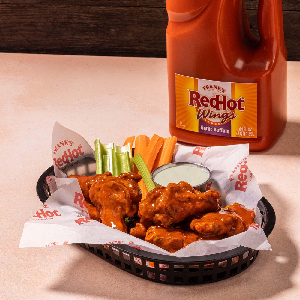 Franks RedHot Garlic Buffalo Wings Sauce color-closeup—vibrant red hue signaling heat.