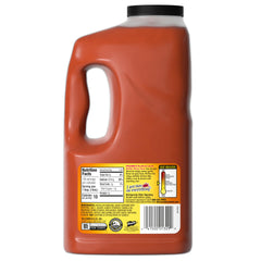 Franks RedHot Garlic Buffalo Wings Sauce pour-spout—even, easy coating for batches.