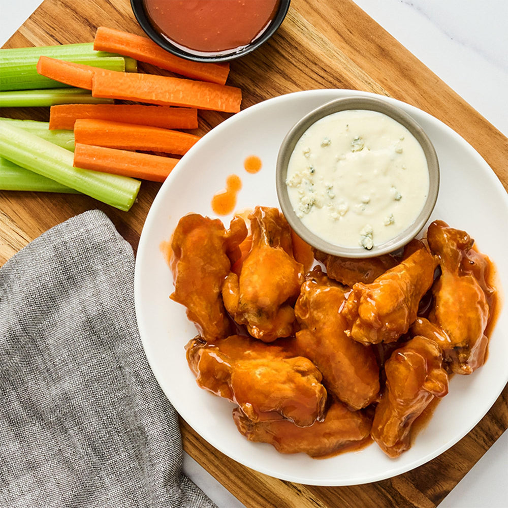 Frank's RedHot Mango Habanero on tacos enhances heat with mango note.
