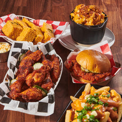 Fries sprinkled with Frank's Nashville Hot Seasoning for a spicy, crisp finish