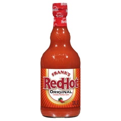 Frank's RedHot Original bottle being poured to add heat and flavor to wings