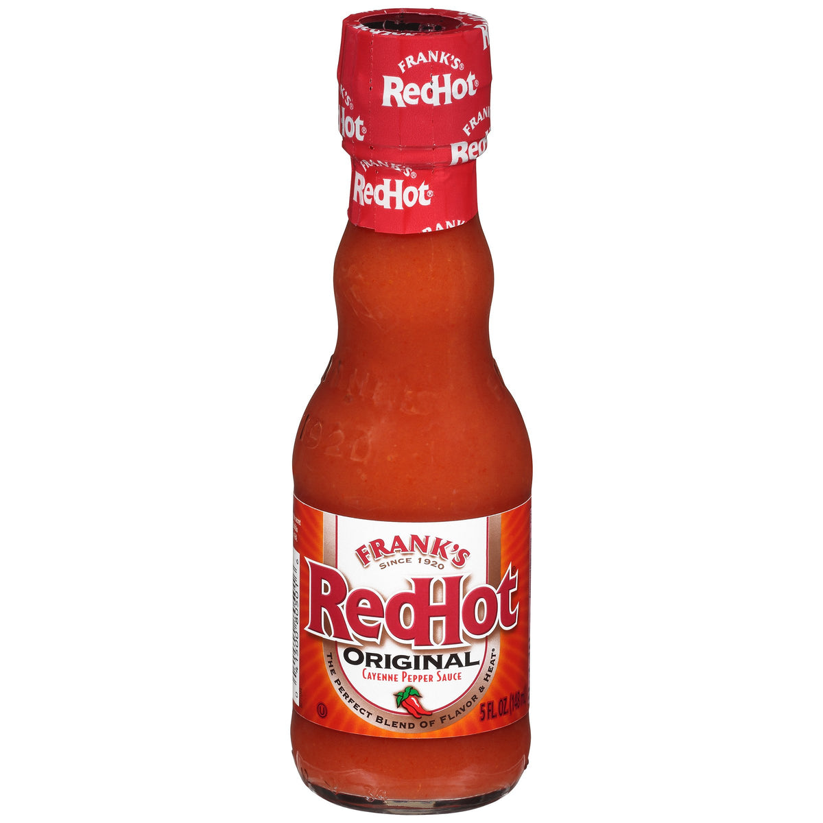 Frank's RedHot Original bottle pouring heat for wings and more