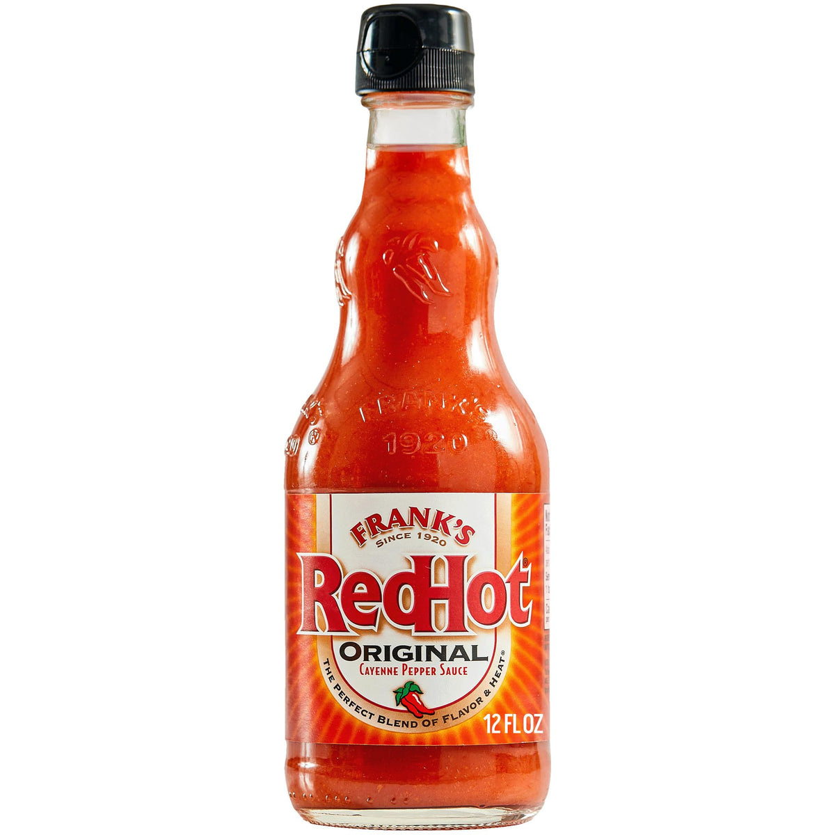 Franks RedHot Original bottle pour adds bold heat to wings and breakfast