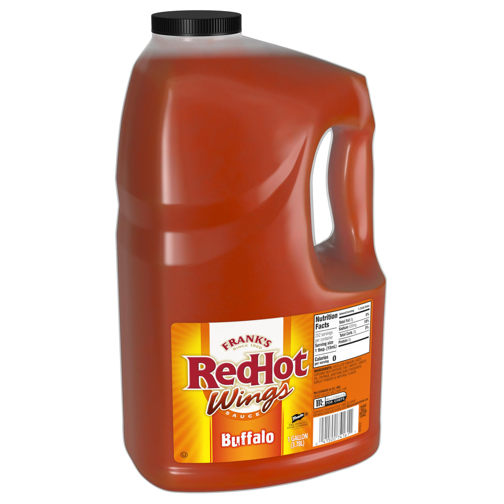 Frank's RedHot Original Buffalo Wings Sauce bottle pour highlights bold heat and buttery flavor