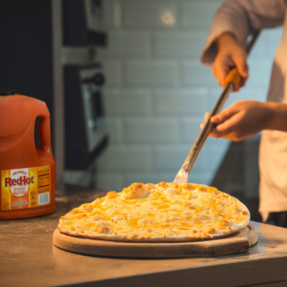Frank's RedHot Original Buffalo Wings Sauce handle-easy-carry supports transport