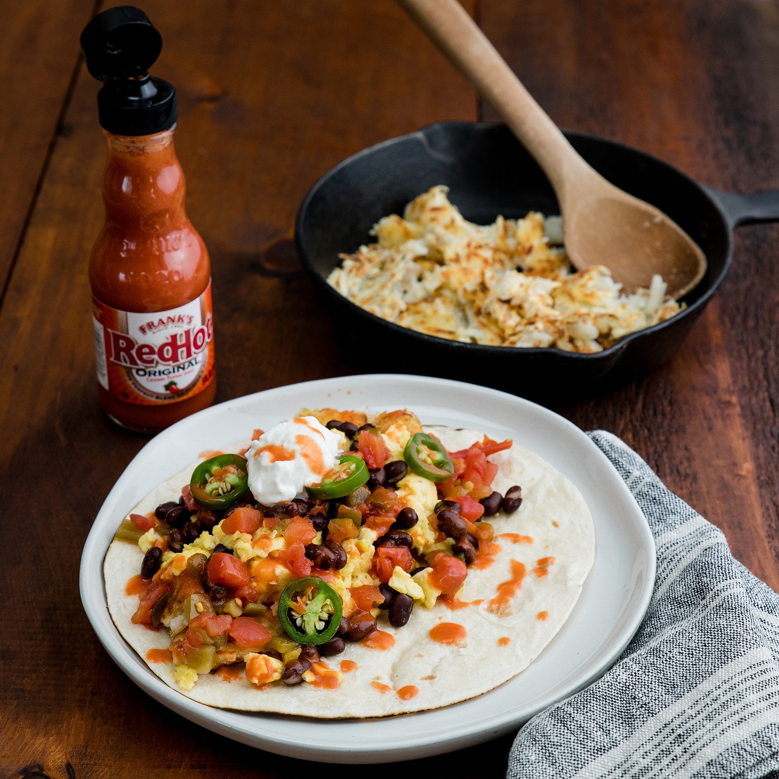 Chicken sandwich topped with Frank's RedHot Original for extra zing