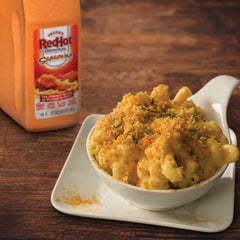 Franks RedHot Original Seasoning on fries, pizza, and vegetables demonstrates versatility.