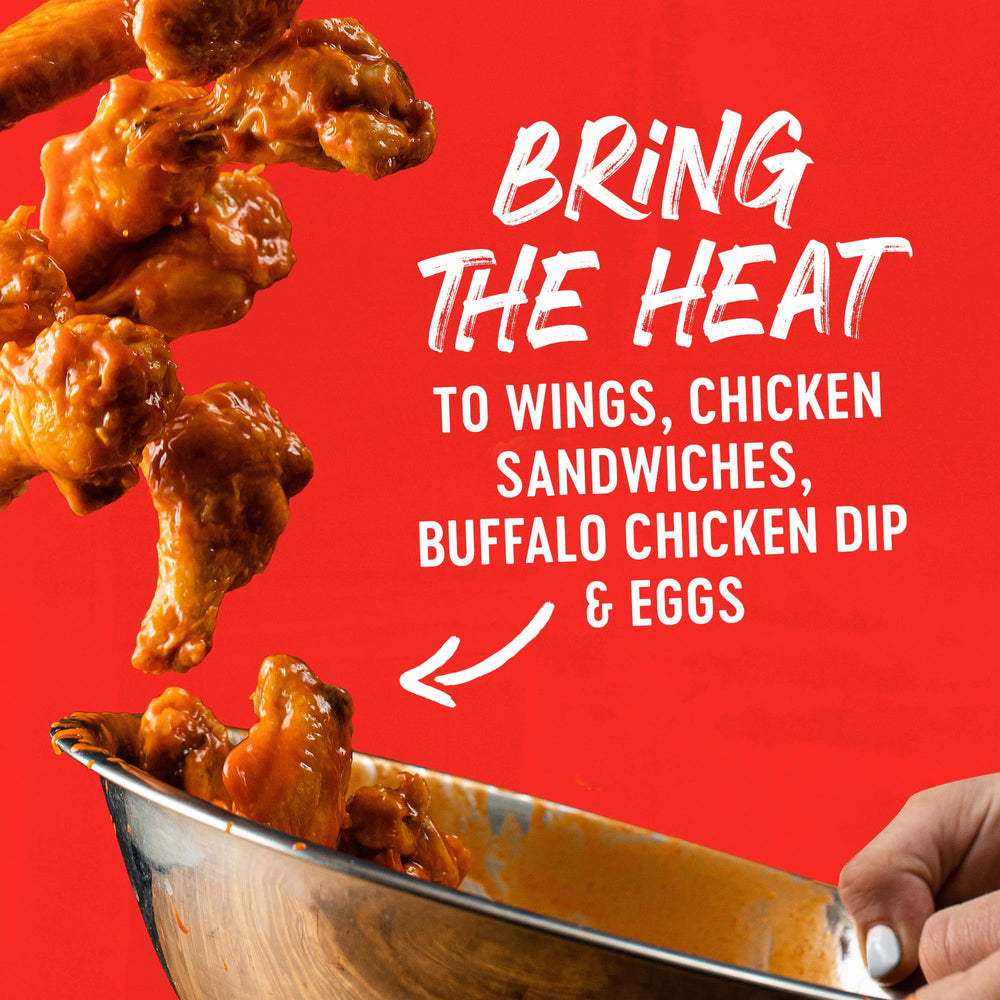 Wings served with Frank's RedHot Original sauce for a spicy glaze