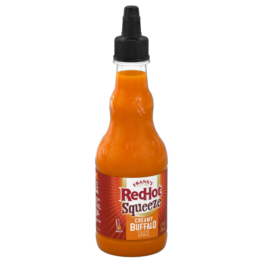 Frank's RedHot Squeeze Creamy Buffalo Sauce bottle with thick, smooth drizzle for easy topping