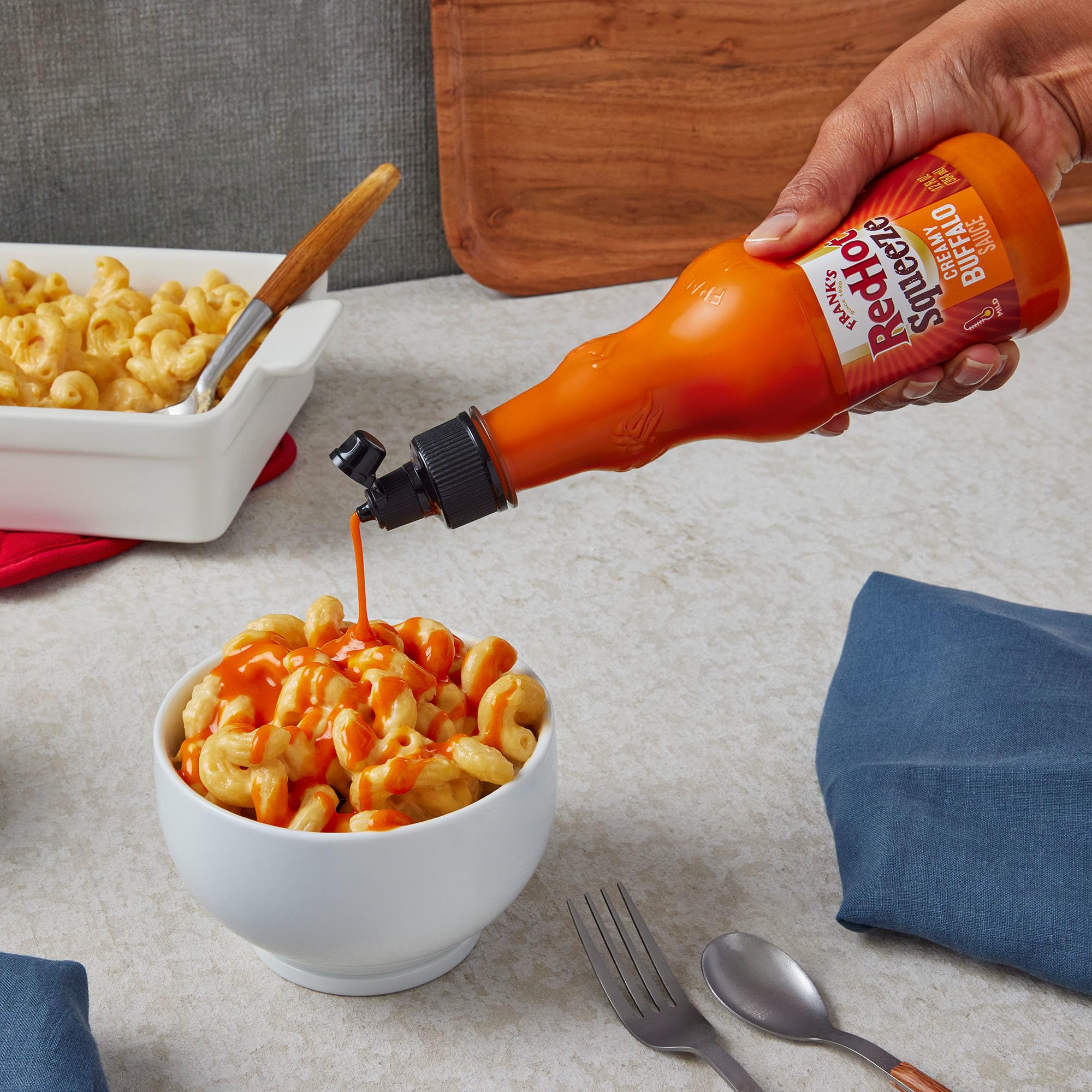 Franks RedHot Squeeze Creamy Buffalo Sauce on fries for creamy, mild heat